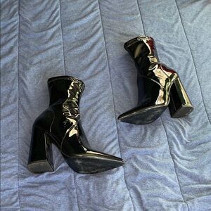 Black Boots steve madden a couple stains and small rip